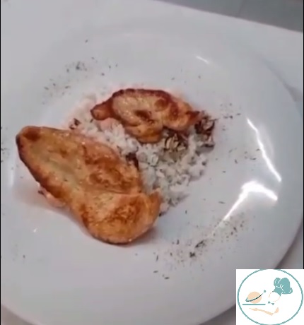 Arroz con pintada y vinagreta de almendras